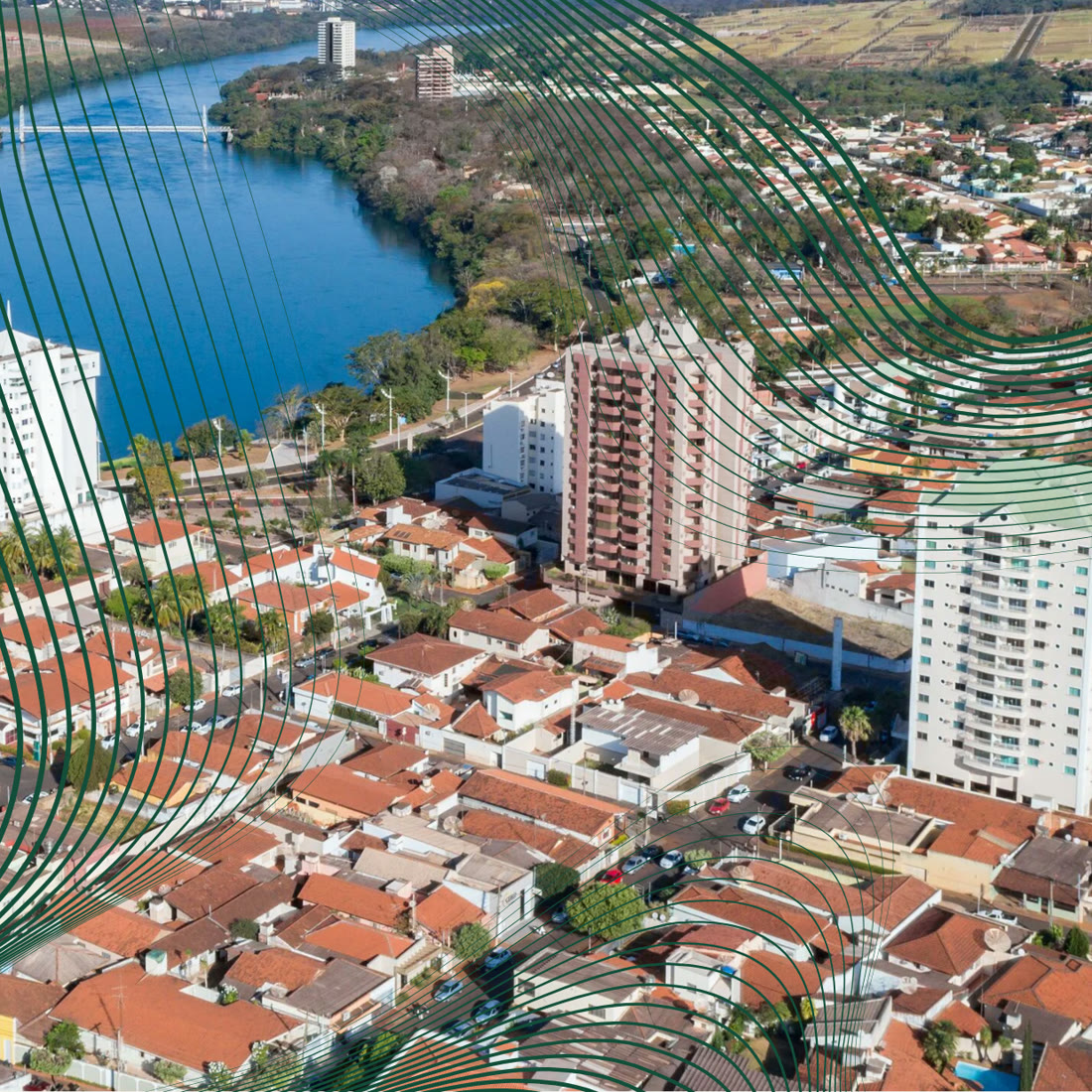 Vista a&eacute;rea de Itumbiara, com o Rio Parana&iacute;ba e arte de ondas verdes